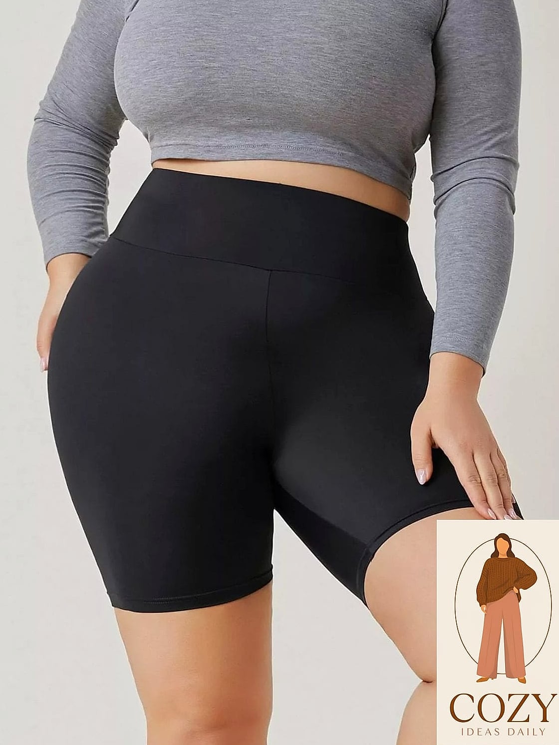 Biker Shorts Under an Oversized Sweater Dress
