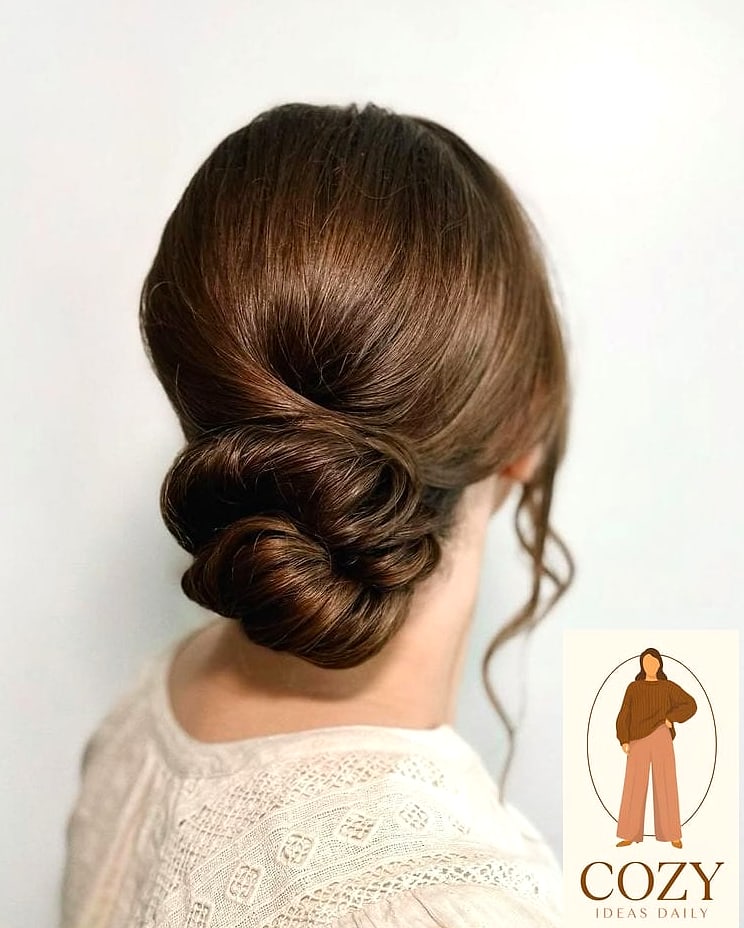 Low Bun With Face-Framing Tendrils