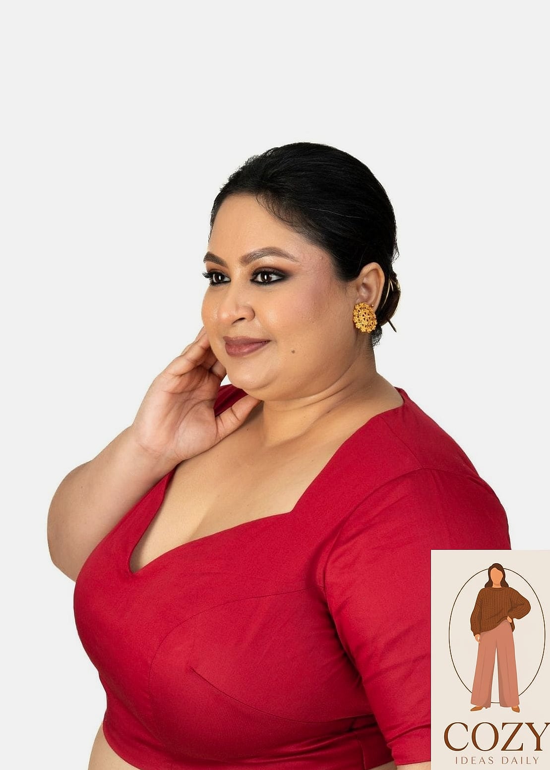 Sleeveless Blouse with Statement Earrings